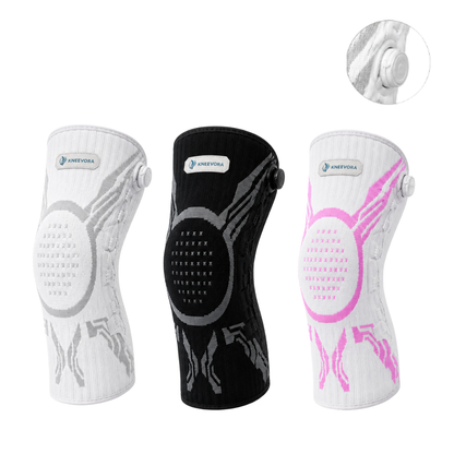 Three knee support sleeves shown on a white background: one white with gray graphics, one black with gray graphics, and one white with pink graphics. A circular inset at the top right shows a close-up of the knee joint area.